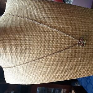 Silver tone necklace with triple heart pendant